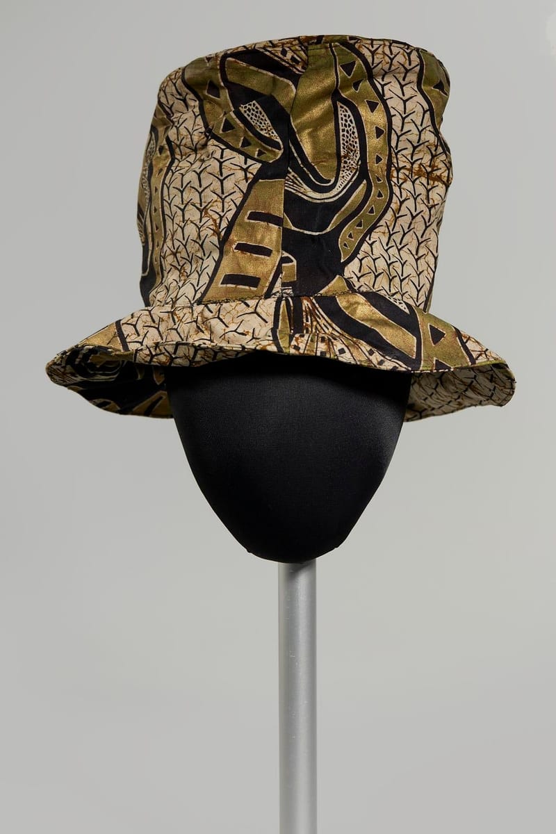 High crown hat in abstract print fabric